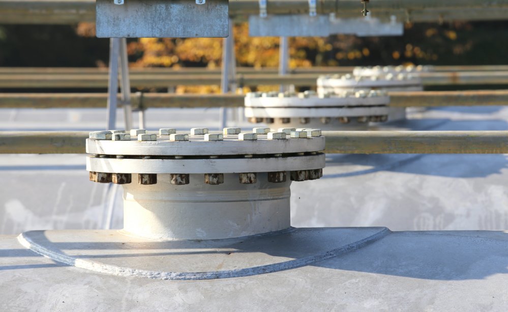 Engineer investigating industrial plant equipment on site